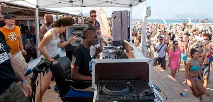 Zy:on aka Brian Belle Fortune DJing on the beach in Sardinia at SunAndBass 2014